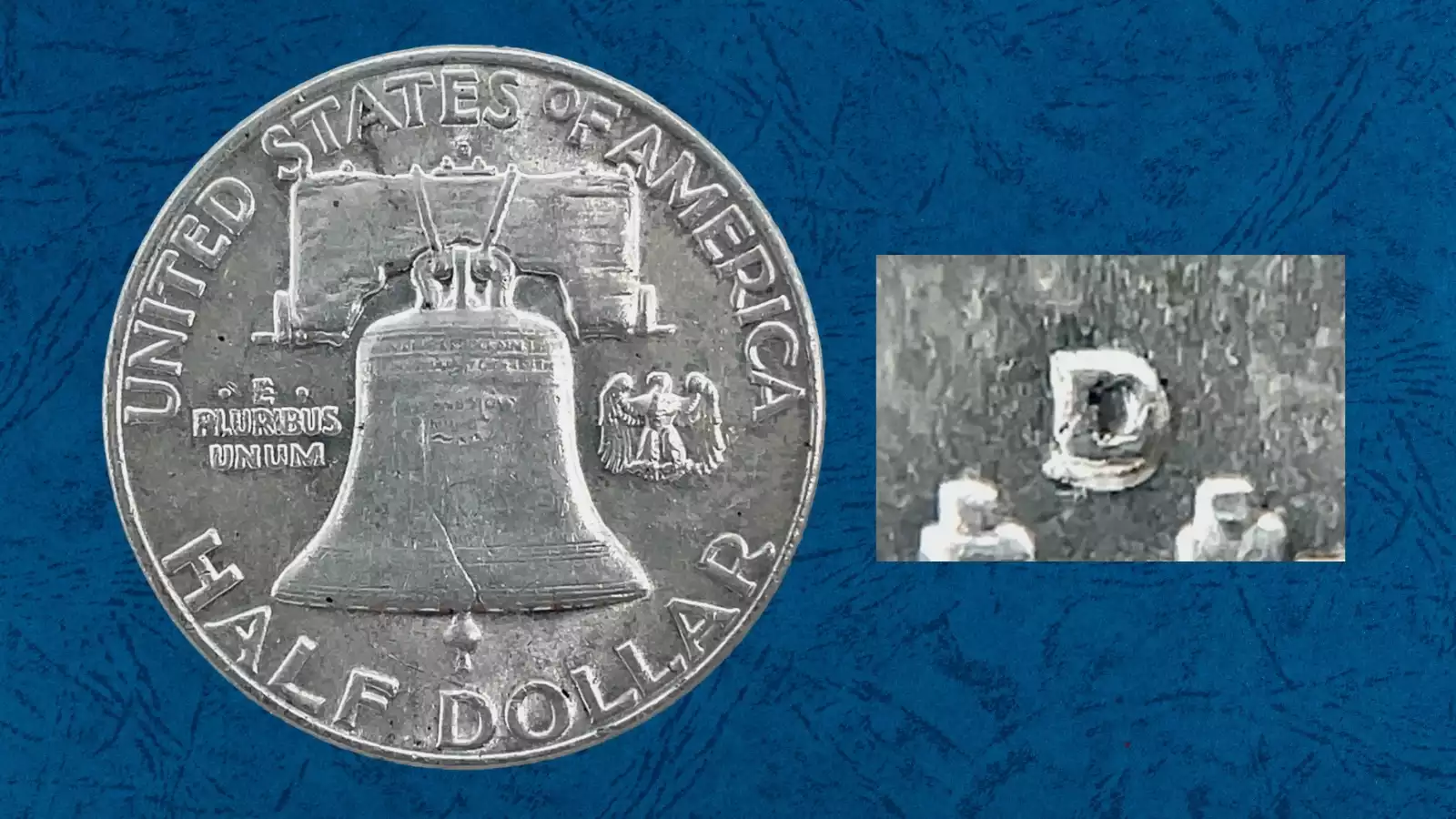 1963-D Franklin half dollar Repunched Mint Mark (RPM) — close-up of D mint mark on reverse showing secondary D impression